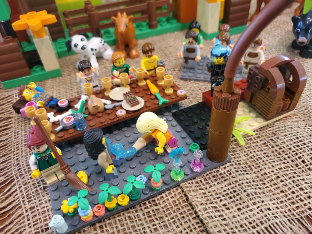 Lego sculpture of Mary Magdeline anointing Jesus's feet