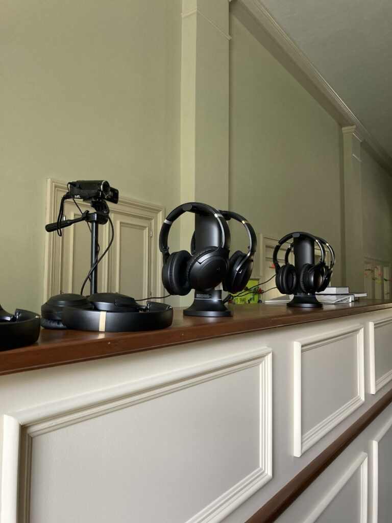 headphones sitting on charging stands